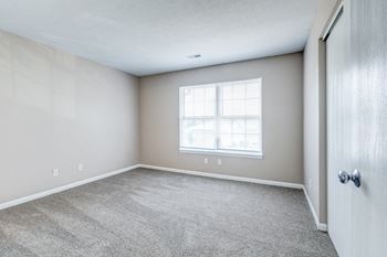 Carpeting in living room and bedrooms at HUB of New Albany, New Albany, 47150
